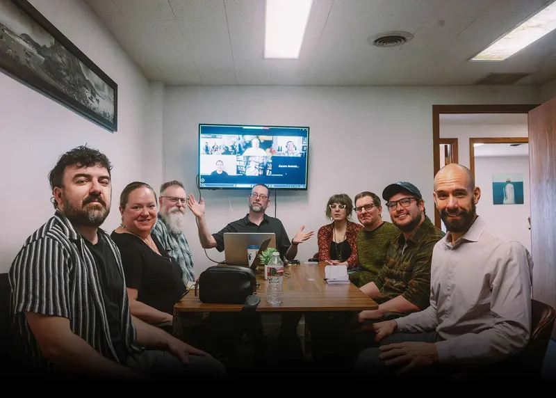 The White Whale Web team around a conference table.